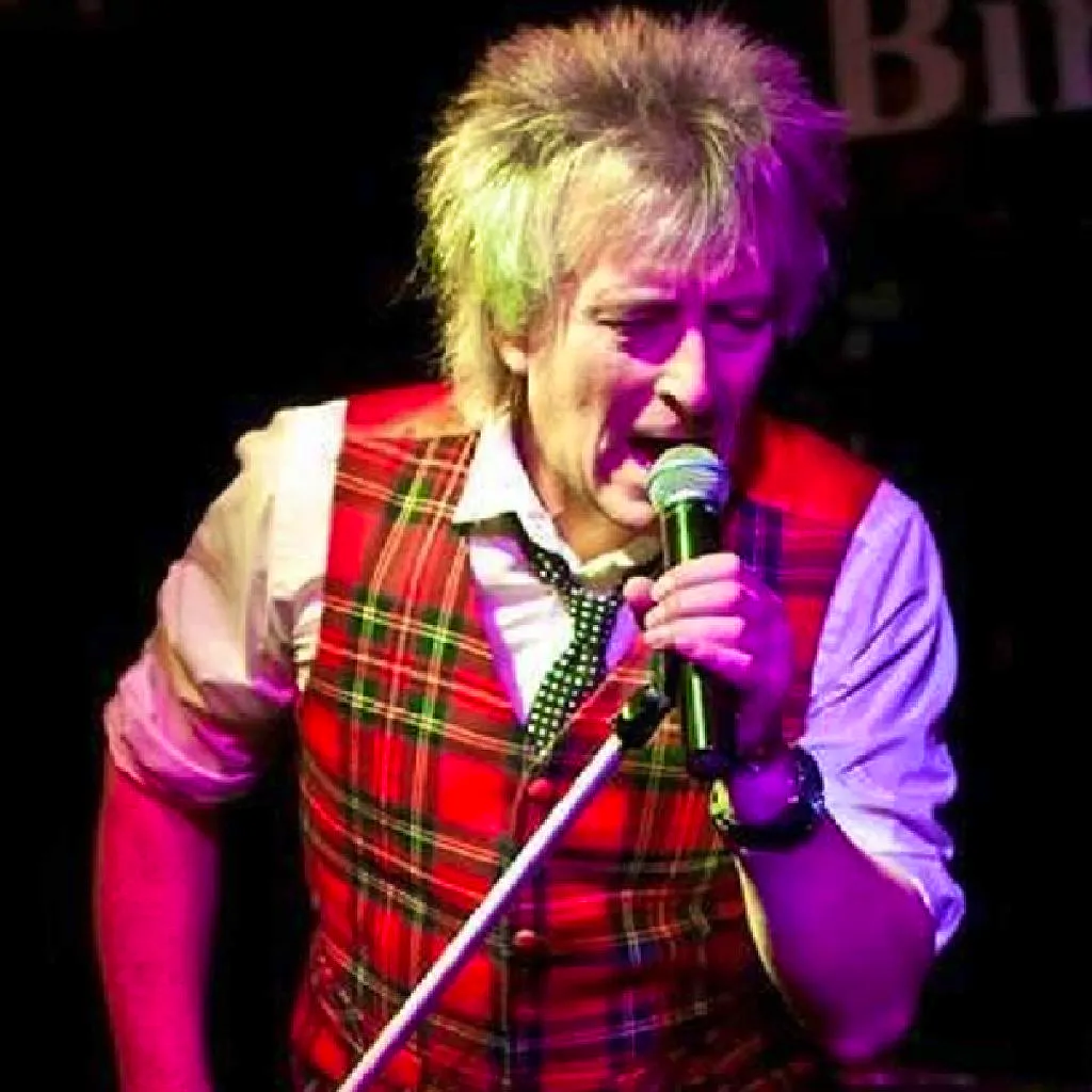 Gary Pease as Rod Stewart